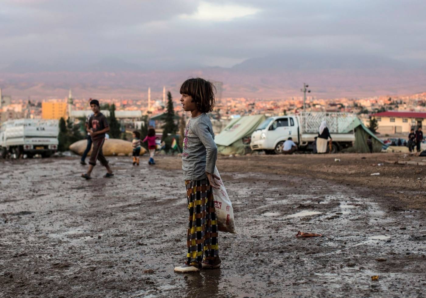 Kuvan lapsi on yksi tuhansista Irakin kurdeista, jotka joutuivat pakenemaan maan kurdialueilta pohjoiseen talvella 2014. Kuva: OCHA/Iason Athanasiadis. 